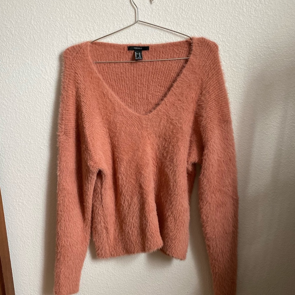 pink fuzzy sweater